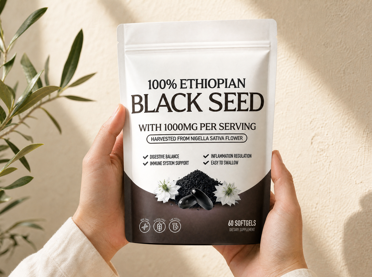 Hands holding the Ethiopian Black Seed pouch